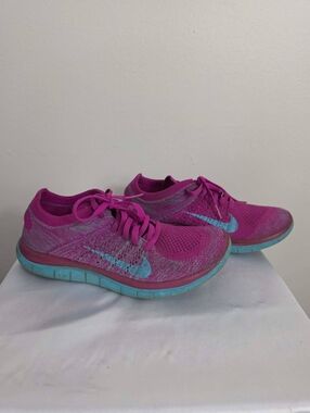 Nike Pink Knit Sneakers with Teal Swoosh